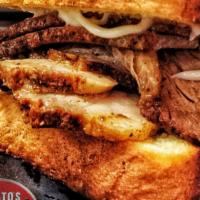 Smoked Texas Rub Brisket Sandwich · Half Pound of Smoked Texas Rub Brisket on Thick Texas Toast with choice of Free Toppings and...