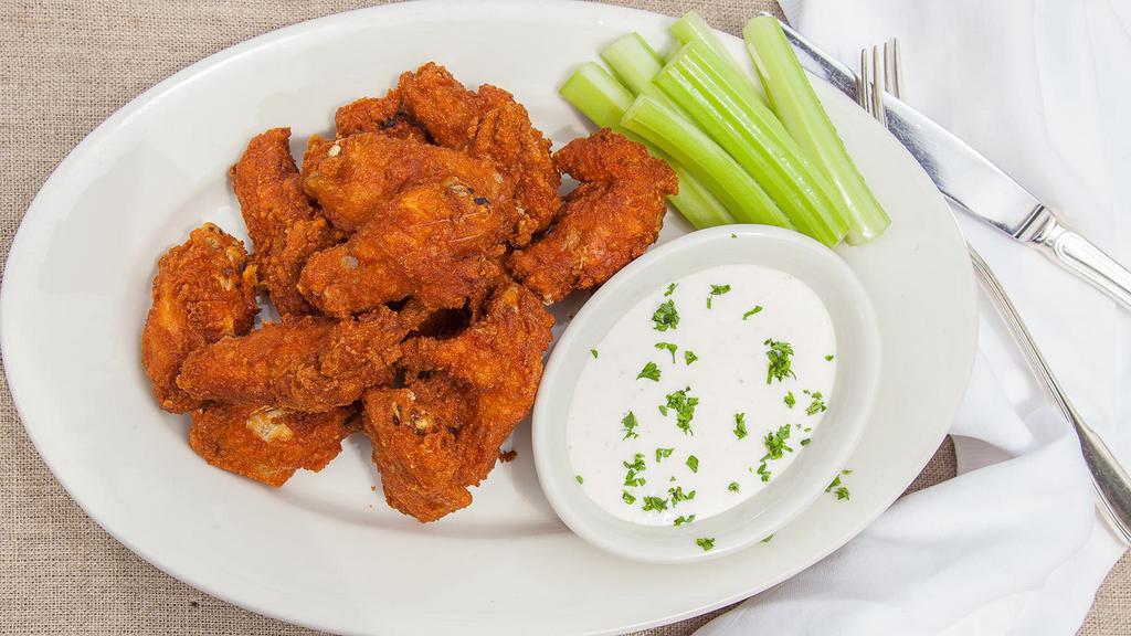 Chicken Wings · Deep-fried with a peppery zing! Choose your style wing zing (plain no sauce), tossed in buffalo sauce or BBQ sauce. Served with choice of ranch or bleu cheese.