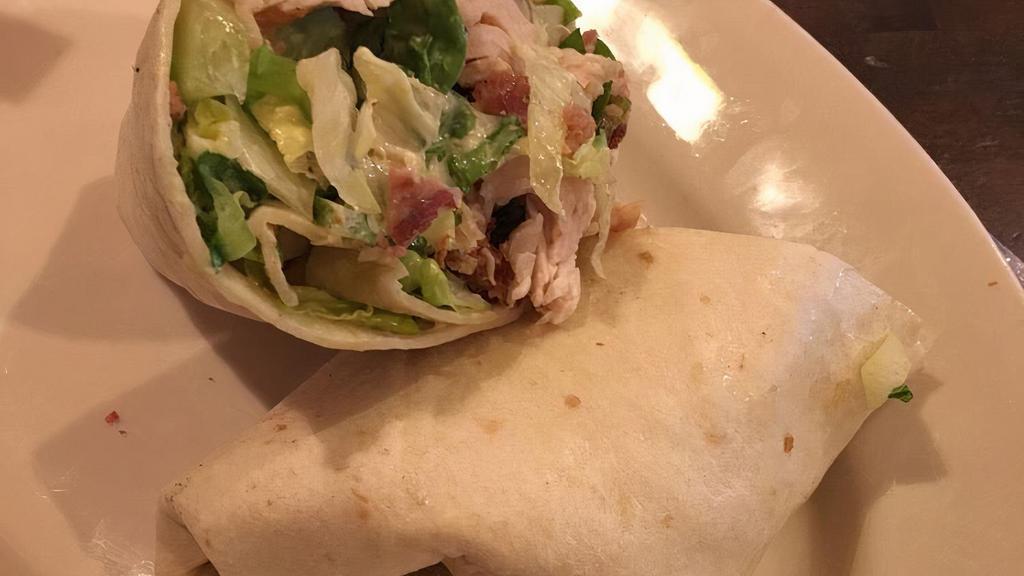 Turkey Avocado Blt Wrap (Deluxe) · Roast turkey, avocado, bacon, lettuce, tomato, and pesto mayo.