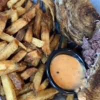 Shredded Corned Beef Reuben · Our corned beef is slow-roasted in-house until it falls apart, and topped with fried kraut a...