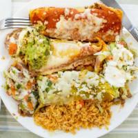 Enchiladas Mexicanas · One chicken, one beef and one cheese enchilada covered with three different sauces, served w...
