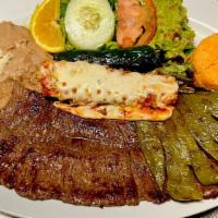 Carne Asada A La Tampiquena · Grilled tampiquena skirt  steak cooked to your order with one cheese enchilada and grilled c...