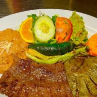 Carne Asada · Grilled skirt steak cooked to your order with grilled cactus. Served with rice, beans, salad...