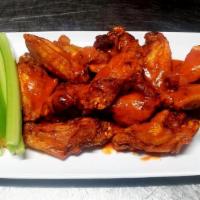Wings 8Pc.  · Wings. Served with fresh carrots, celery and choice of ranch or blue cheese dressing.
