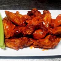 Wings 12 Pc.  · Wings. Served with fresh carrots, celery and choice of ranch or blue cheese dressing.