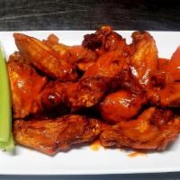 Wings 16 Pc. · Wings. Served with fresh carrots, celery and choice of ranch or blue cheese dressing.