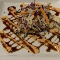 Jumbo Lump Crab Cakes · Asian slaw, spicy aioli, sweet soy.Consumption of raw or undercooked meats, poultry, shellfi...