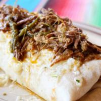 Super Burrito · Chile Verde w/ chunks of pork and beans…all inside