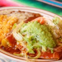 Enchiladas Mexicanas · Three chicken enchiladas, topped w/lettuce, tomato, sour cream, 
Guacamole served w/rice & b...
