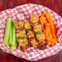 Chicken Skewers · Three grilled chicken skewers with a side of our famous spicy asian dipping sauce. Served wi...