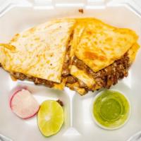 Quesadilla · its a 2  flower tortilla, with melted cheese, meat of your choice, half fried on the grill.