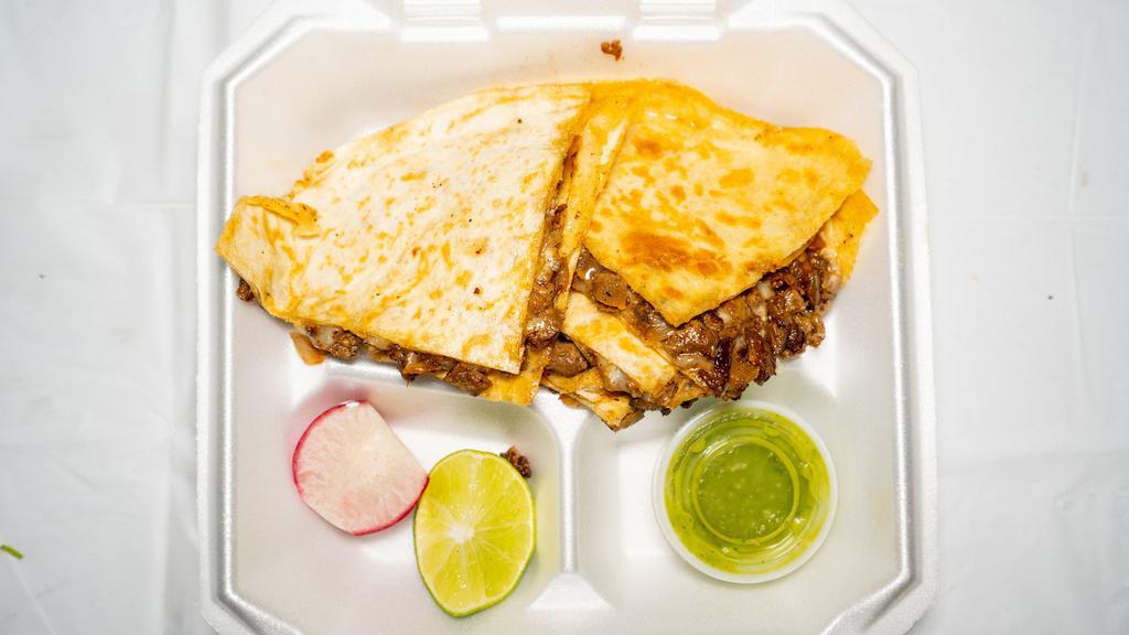 Quesadilla · its a 2  flower tortilla, with melted cheese, meat of your choice, half fried on the grill.