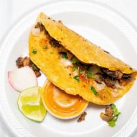 Taco Uruapan · they are handmade at home corn tortilla. with melted cheese, meat of your choice,  coriander...