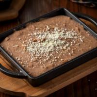 Refried Beans · mashed pinto, cotija