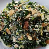 Lacinato Kale · Kale, napa cabbage, Parmesan, slivered almonds, lemon vinaigrette.