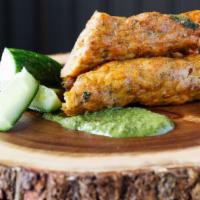 Mint Cafe Spiced Tangri Kebab Chicken · Whole tender chicken leg portions marinated in yogurt and special spices & cooked in the Tan...