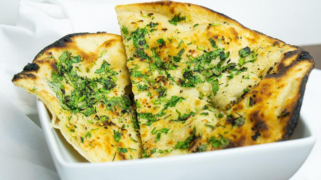 Garlic Naan · Naan bread stuffed with fresh garlic, cilantro & seasonings.