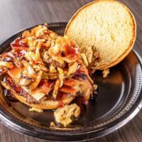 Mamas Bourbon Smash Burger · 1/3 lb smash burger with crispy onion, grilled mushrooms, Swiss cheese, bacon, and bourbon s...