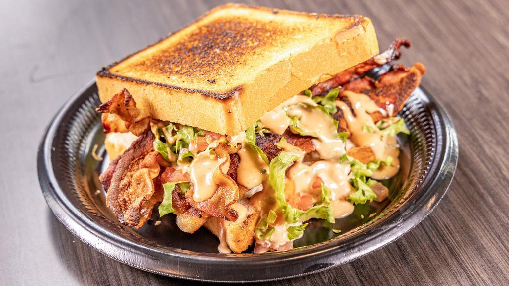 Mama'S Blt · Bacon, lettuce, tomato, and Mama’s signature sauce on grilled Texas toast.