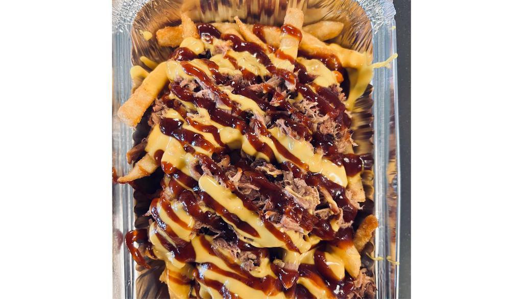 Bbq Pork Fries · BBQ pork, BBQ sauce, and melted cheese.