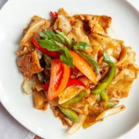 Drunken Noodle · Medium-hot.  Stir-fried flat rice noodle with garlic,  chili, bell peppers,  onion, tomato, ...