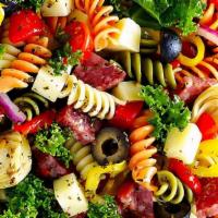 Antipasto Salad (Catering) · Tri-Colored Rotini or Lettuce, onions, tomato, salami, imported cheese, red onion, pepperonc...