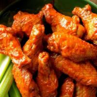 Chicken Wings · Buffalo, Garlic Parmesan, or BBQ Served with celery and your choice of ranch or bleu cheese ...