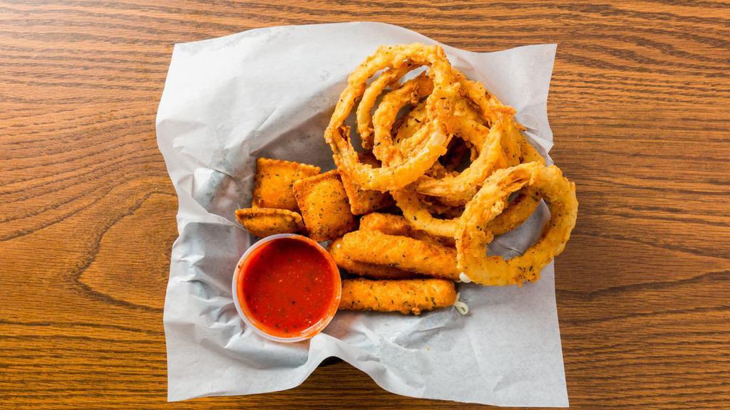 Combo Apettizer · Four cheese sticks, four ravioli, and onion rings.