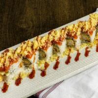 Spicy Crunch · Spicy tuna over shrimp tempura and cucumber roll with tempura crumb with spicy mayo and eel ...