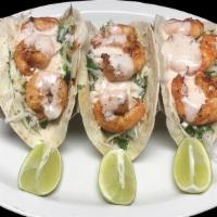 Special Shrimp Taco · 3 shrimp taco. Comes with flour tortilla, cabbage, cilantro, Mexican ranch, lime and side ri...