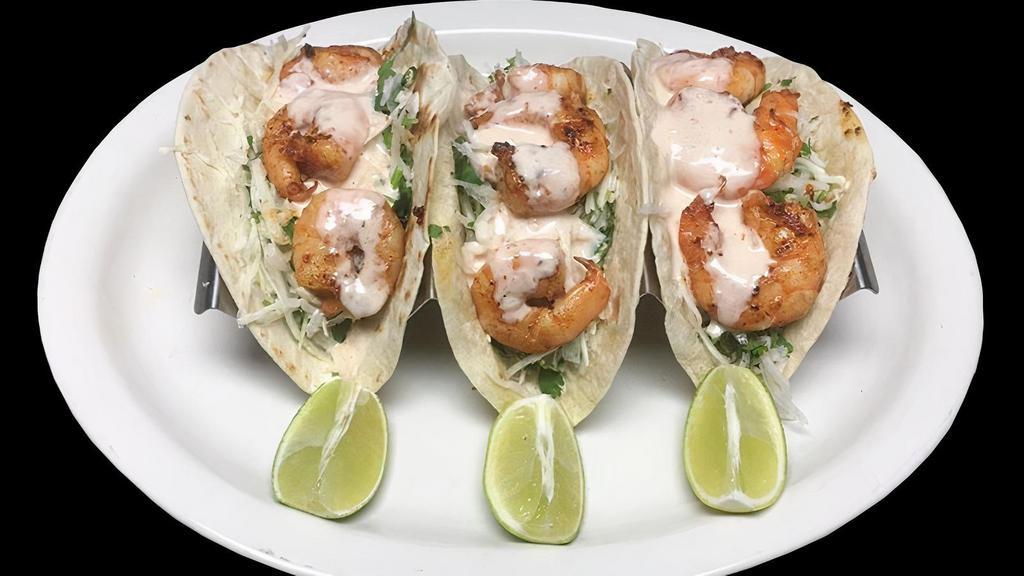Special Shrimp Taco · 3 shrimp taco. Comes with flour tortilla, cabbage, cilantro, Mexican ranch, lime and side rice.