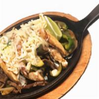 Tex Mex Fajita · Steak, and Chicken, with grilled bell peppers, 
onions, tomatoes, zucchini. mozzarella chees...