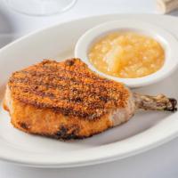 Heritage Berkshire Pork Chop (12 Oz) · Center Cut Pork Chop on the bone. Dusted with BBQ Rub and broiled, served with Apple Sauce.