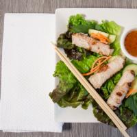 Cambodian Spring Rolls · Shrimp and chicken with glass noodle, onion, and cilantro. Served crispy with bib lettuce, a...