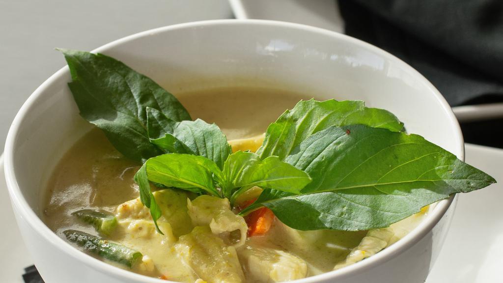 Thai Green Curry · Bamboo shoots, long beans, baby corn, coconut milk, bell pepper, and eggplant.