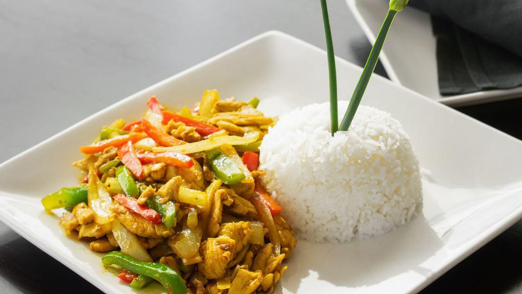 Keo House Stir-Fry · Lemongrass, galangal, green, and red bell pepper, onion, chili, and turmeric.