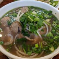 Pho Tai · Fresh rice noodles with eye round steak. Broth, noodles and meat served separately upon deli...