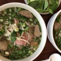 Pho Dac Biet Uptown Pho · Fresh rice noodles with eye round steak, flank, soft tendon, tripe and beef meatballs. Broth...