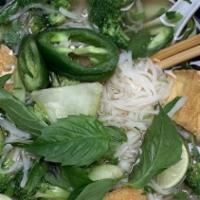 Pho Chay (Vegetarian Pho) · Fresh rice noodles with vegetable and tofu. (vegetable broth), noodles and broth served sepa...