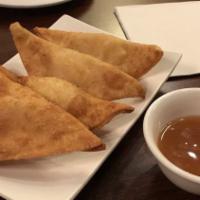 Crab Rangoon · Four pieces. Deep fried pastries filled with crab meat and cream cheese.