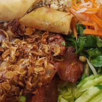 Bun Thit Nuong Cha Gio (Vermicelli Noodle With Pork And Egg Roll) · Steamed rice noodle with shredded pork and egg roll. Served with lettuce, peanut, onion, cuc...