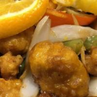 Orange Chicken · Chicken breast deep fried with battered in a special orange sauce topped with orange peels.