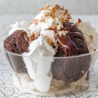 Brownie Fudge Delight · Your choice of ice cream with chocolate brownies topped with hot fudge, Carmel, whipped crea...