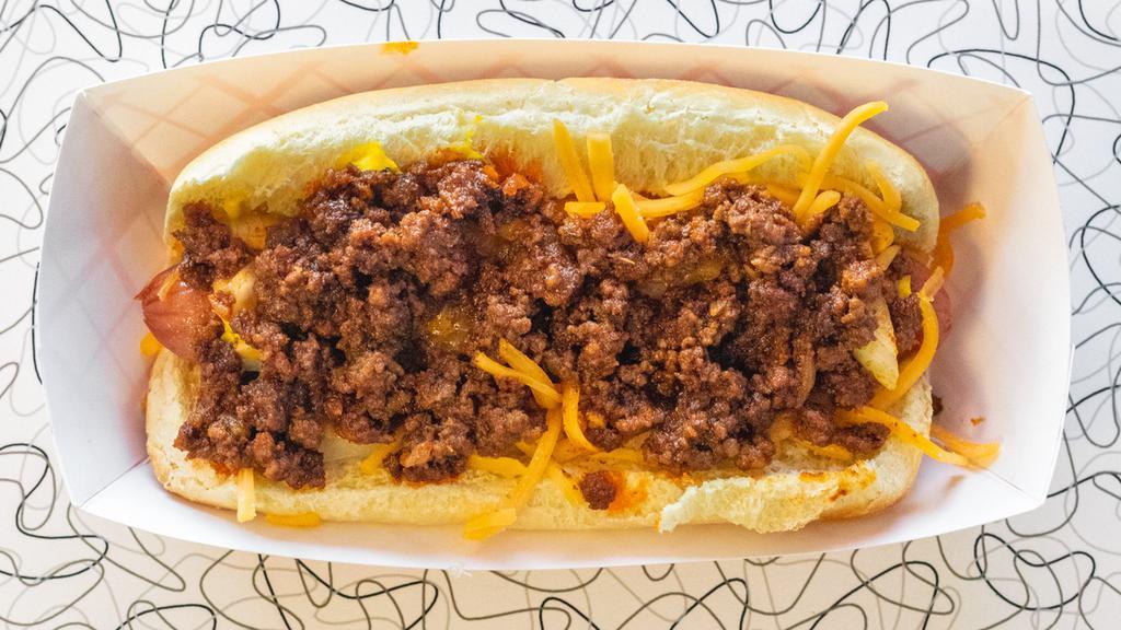 Coney Island · Choice of hot dog, bratwurst, hot link or polish topped with our signature meat sauce, yellow mustard, onions, and cheese.