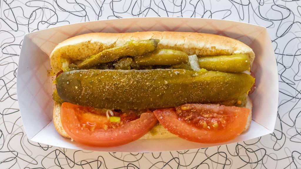 Chicago Dog · Choice of beef hot dog, polish, hot link, or brats. Toppings included: yellow mustard, onions, sweet relish, sports peppers.