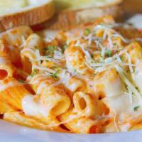 Baked Penne · Penne in a chunky meat sauce, covered with mozzarella and baked to perfection.