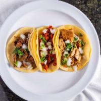 Taco · Soft corn tortilla filled with your choice of meat and topped with onion and cilantro. Singl...