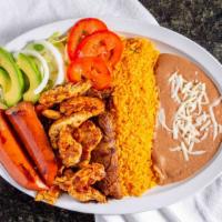 Plato Mixto · Grilled steak, chicken, and sausage, served with onions, lettuce, tomatoes, avocado, rice an...