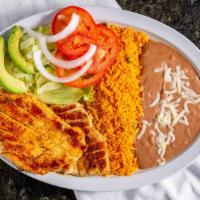 Pollo Asado · Grilled chicken, served with lettuce, avocado, tomatoes, onions, rice and refried beans.