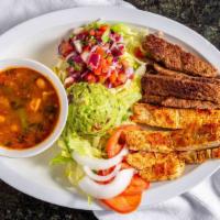 Ranchero · Grilled chicken and steak, served with lettuce, onions, tomatoes, guacamole, pico de gallo a...
